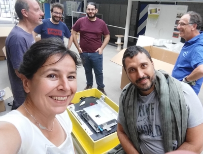 Researchers in front of the detector for the mission.
